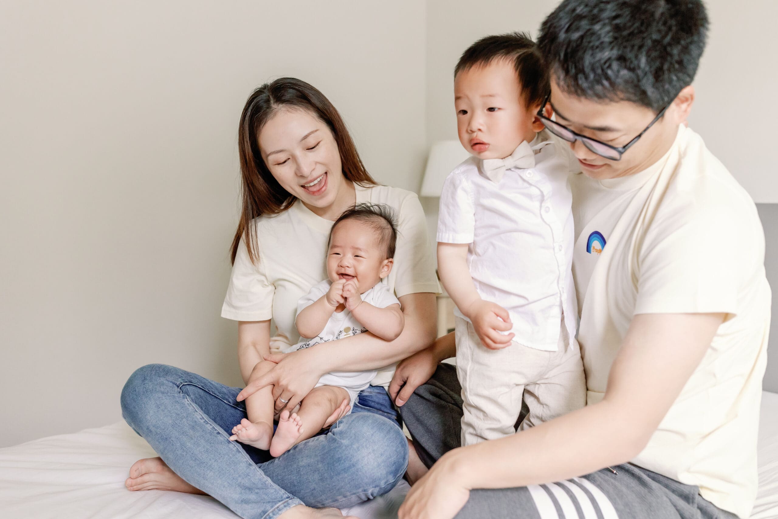 Seattle family photographer - parents with newborn at home
